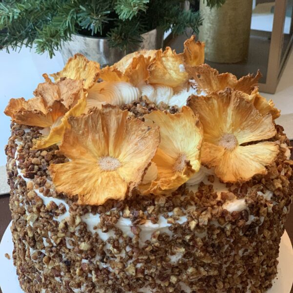 Hummingbird Cake With Cream Cheese Frosting and Pecans